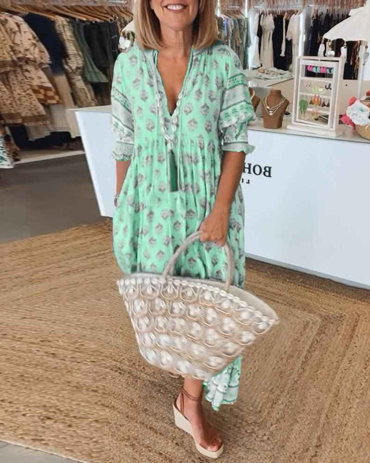 MANA | VESTIDO FLORAL CHIQUE MIDI COM DECOTE EM V
