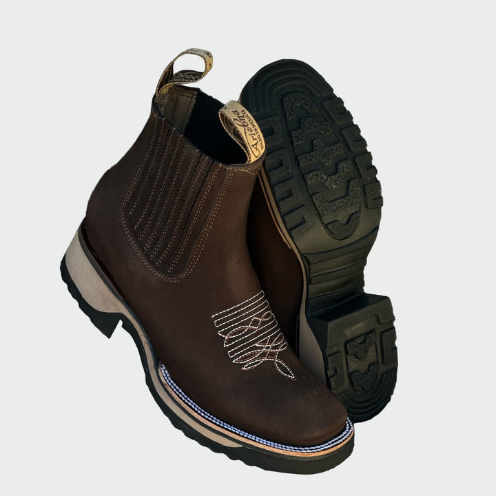 Botas de cowboy em pele