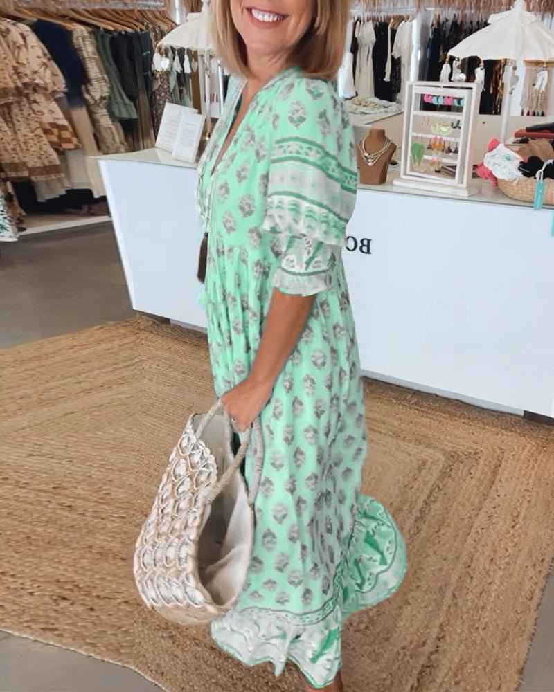 MANA | VESTIDO FLORAL CHIQUE MIDI COM DECOTE EM V